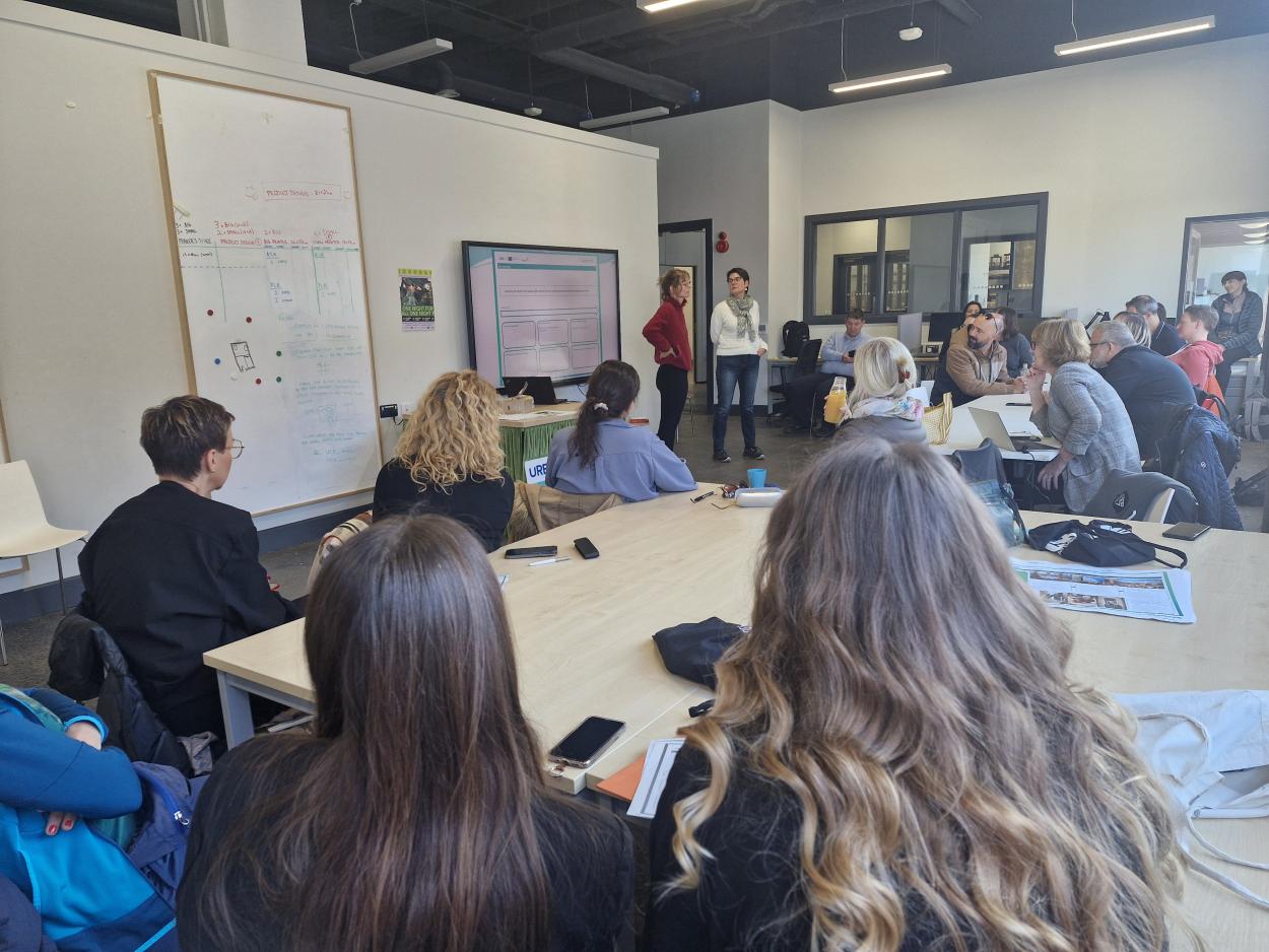 People watching a presentation.