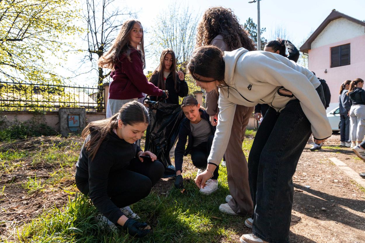 Boys and Girls picking up trash