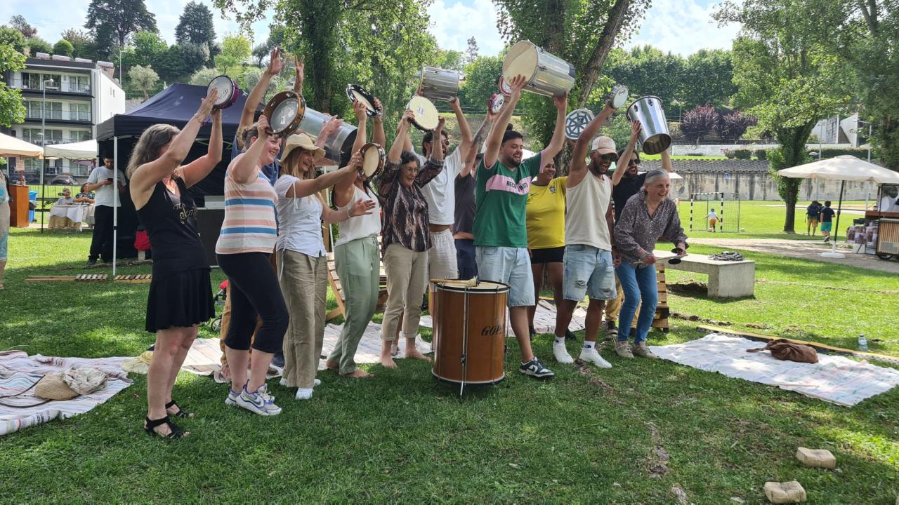 Group of people holding musical instruments in the air