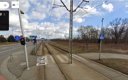 Kosmonautów street tramline before (2021) greening. Photo credits: Google Street view