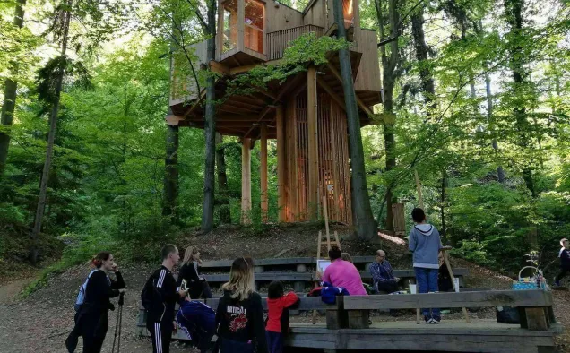 A modern and innovative treehouse structure located in a dense forest in Celje. Photo credits: City of Celje