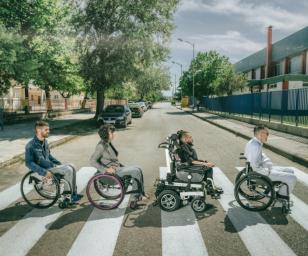 Each person has a unique wheelchair, showcasing diversity in mobility aids