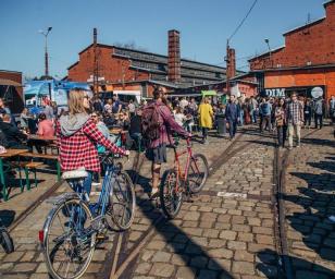 People and children with bicycles