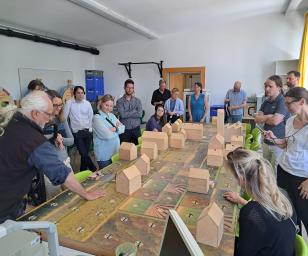 People engaged in an educational activity together
