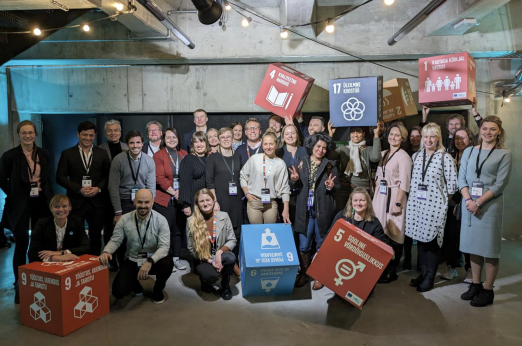 Partners from the Cities for Sustainability Governance network holding boxes representing the UN Sustainable Development Goals (SDGs). Source: Cities for Sustainability Governance.