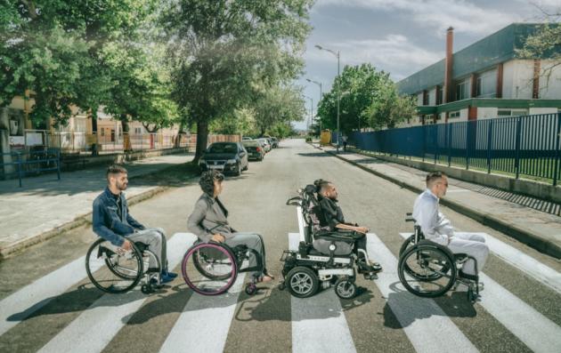 Each person has a unique wheelchair, showcasing diversity in mobility aids