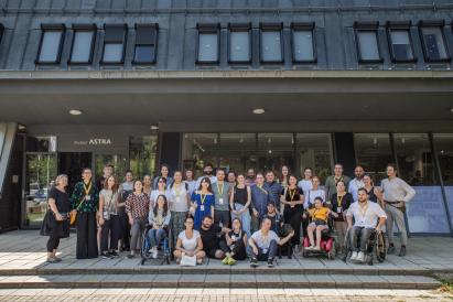 The participants in the Empathy Retreat. The image shows the 32 people and trainers in front of the Museum, where some activities were held. (Source: Robert Barlea for AMAIS, 2022).